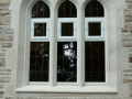 Skilled craftmanship stone arches renovated by Tudor Rose Masonry & Conservation Ltd